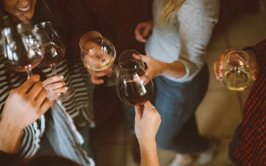 women drinking wine
