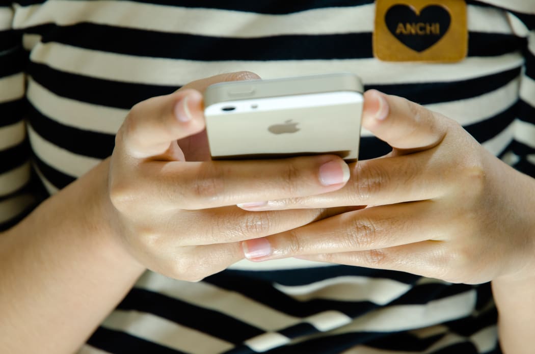 Person using phone.