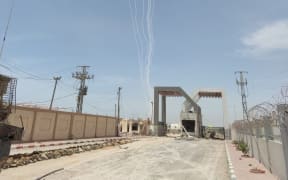 Hamas' latest rocket attack on Israel, seen from the Rafah Crossing.