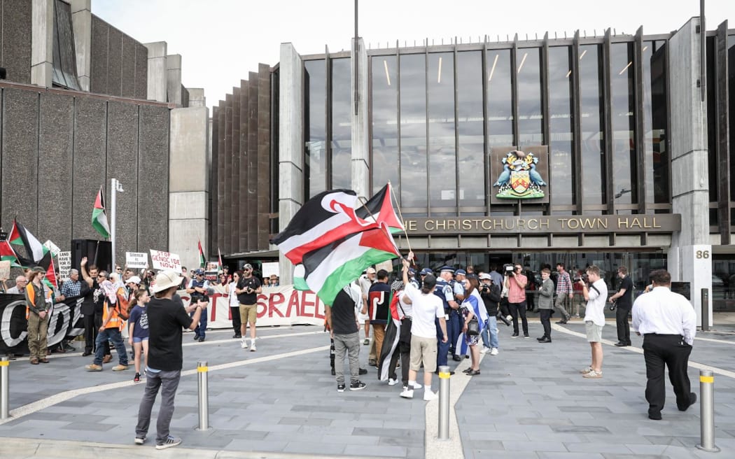 Several protesters gathered outside Winston Peters' State of the Nation Speech Sunday, 23 March.