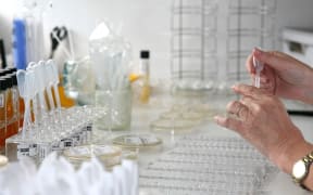 6198722 17.03.2020 An employee of the laboratory of the gene and cell technology prepares a specimen at Kazan Federal University in Kazan, Russia. Staff members of the university began developing a vaccine against coronavirus based on published data on the structure of the virus genome.