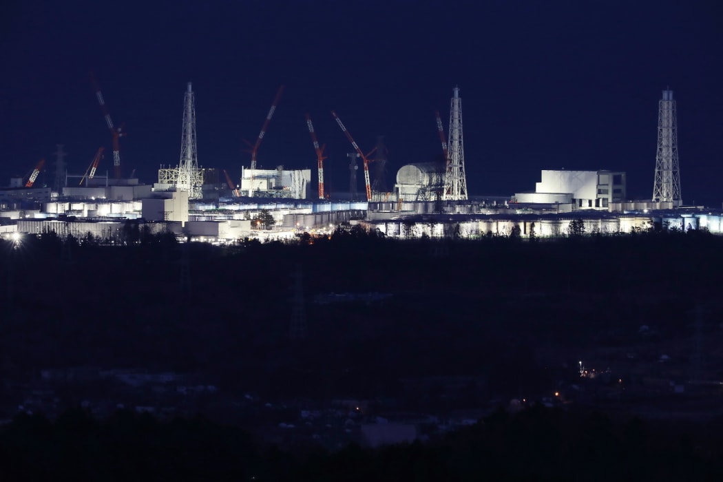 Fukushima Daiichi nuclear power plant  lit up in Okuma.
