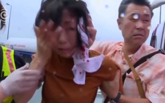 Tour bus overturns in Taiwan typhoon that injures at least 170