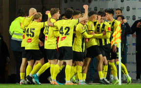 The Phoenix celebrate a goal.