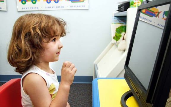 Child looking at computer screen