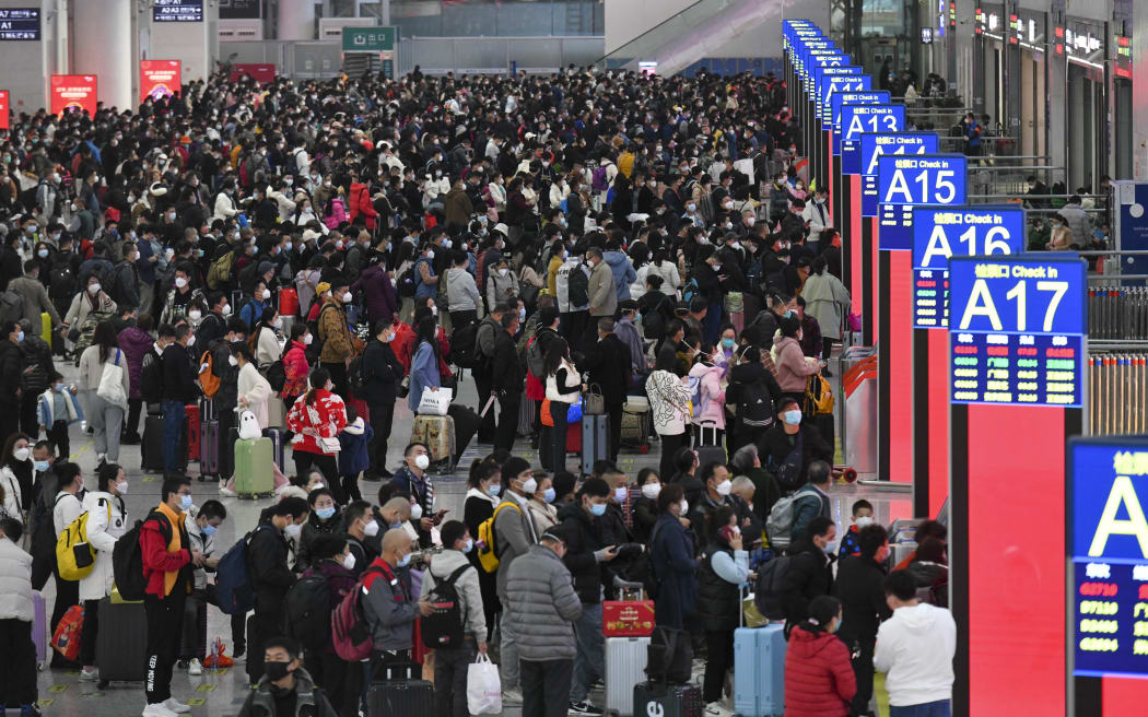 Passengers are seen at Shenzhen North Railway Station in Shenzhen, south China's Guangdong Province, 7 January 2023. The 40-day Spring Festival travel rush in China kicked off Saturday.