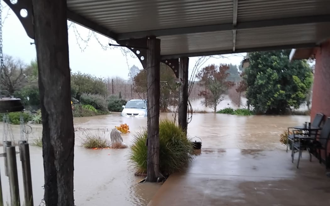 Bronwyn Webby has been evacuated from her property in Lower Moutere because her home is surrounded by rapidly rising floodwater.