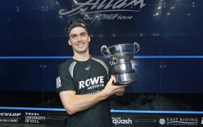 Winner of the British Open Men's title Paul Coll of New Zealand with the trophy. 2022.