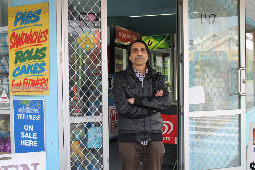A photo of Kamlesh Patel outside his Opawa dairy. He says he will fight anyone who tries to robs his store