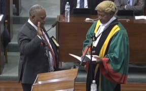 Jotham Napat (left), who was elected prime minister in February, leads the government that supports the "two sexes law". (Vanuatu Broadcasting and Television Corporation)