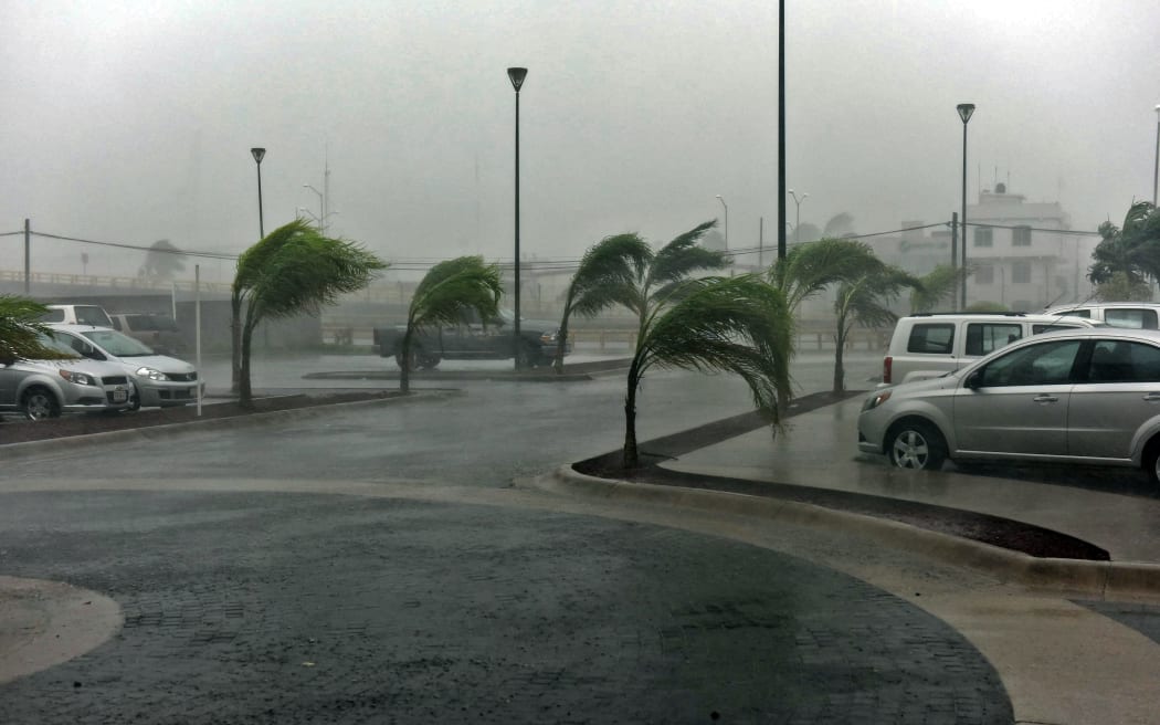 View of a street in Manzanillo, Colima state, Mexico on October 23, 2015, during hurricane Patricia.