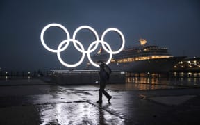 The Olympic rings are lit up at Yokohama Harbour.