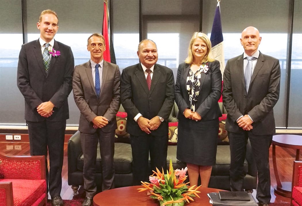PNG prime minister Peter O'Neill (centre) with French officials, including Senator Joelle Garriaud-Maylam (second from right)