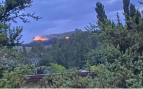 Fire crews battle a large blaze on Te Mata Peak.
