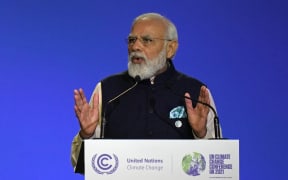 India's Prime Minister Narendra Modi presents his national statement at the COP26 UN Climate Change Conference in Glasgow, Scotland, 1 November 2021.