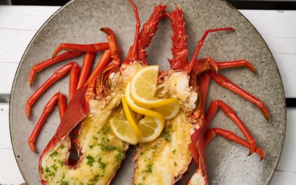 A Nins Bin crayfish with garlic butter and lemon.