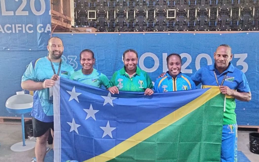 Jenlyn Wini with her competitors in the women's 55kg category.