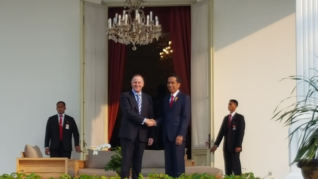 John Key and Indonesia President Joko Widodo on the balcony of the Indonesian Presidential palace.