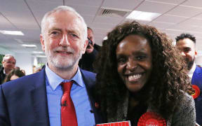Leader of the Labour party Jeremy Corbyn poses for a photograph with Labour's Parliamentary Candidate for Peterborough, Fiona Onasanya (R) after making a speech, at Peterborough Football Club in Peterborough, central England on May 19, 2017.