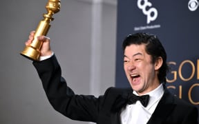Japanese actor Tadanobu Asano poses with the Best Performance by a Male Actor in a Supporting Role on Television award for "Shogun" in the press room during the 82nd annual Golden Globe Awards at the Beverly Hilton hotel in Beverly Hills, California, on January 5, 2025.