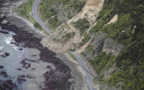 Coastal Road to Kaikoura - rail road cuts through state highway 1