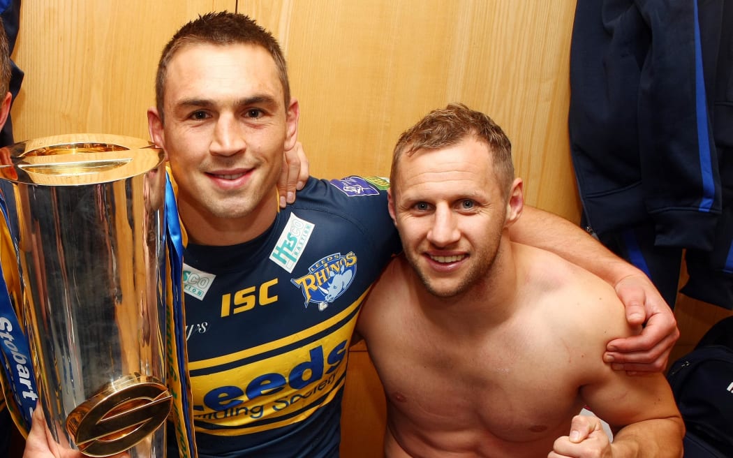 Kevin Sinfield and Rob Burrow with the Super League trophy.