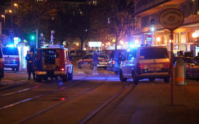 Police cars and ambulances in central Vienna on 2 November, 2020, following a shooting near a synagogue.