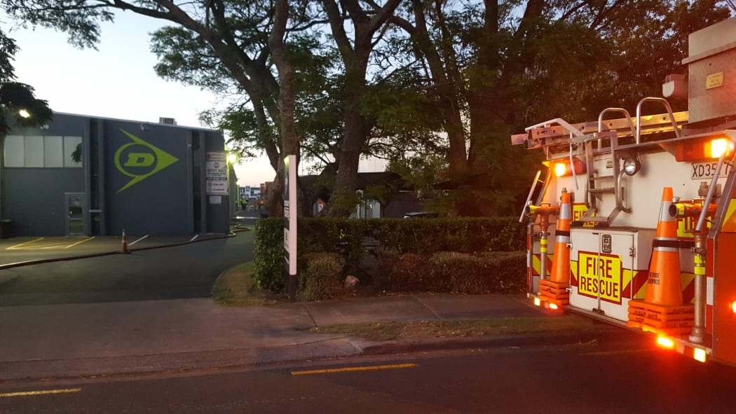 At least 18 crews were called to the blaze at the AKZONobel and AA Insurance warehouse on Rosebank Road in Avondale, Auckland.