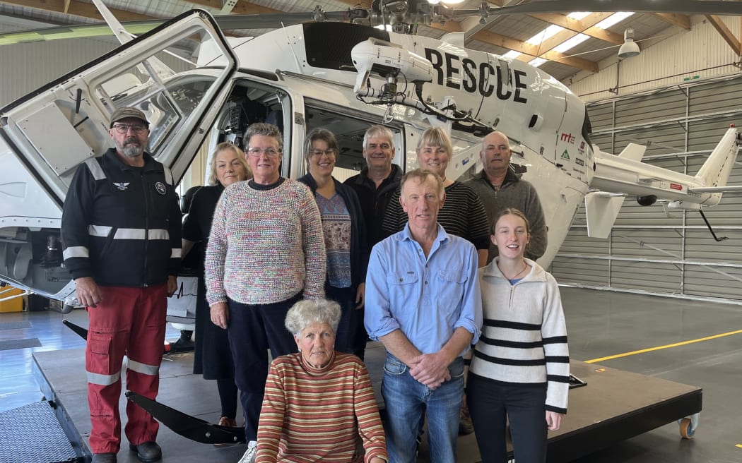 Trust Tairāwhiti Eastland Rescue Helicopter pilot Tony Brice spoke to Bridging Tairāwhiti members about the workings of the BK-117 chopper. Top (from left) are Brice, Chris Hannah, Jan Crawford, Helen Burgess, first aid instructor Tony Giles, Sarah Telford, and Craig O'Brian. Sitting is Mary Clarke and next to her are Ian Burgess and Jazmine Burgess.