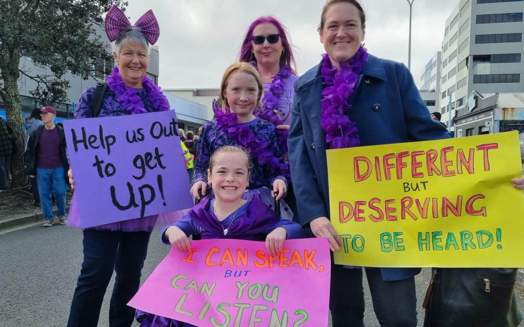 Lucy-Anne Thomas and family wore her favourite colour for the protest.