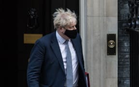 British Prime Minister Boris Johnson leaves 10 Downing Street on 12 January 2022.