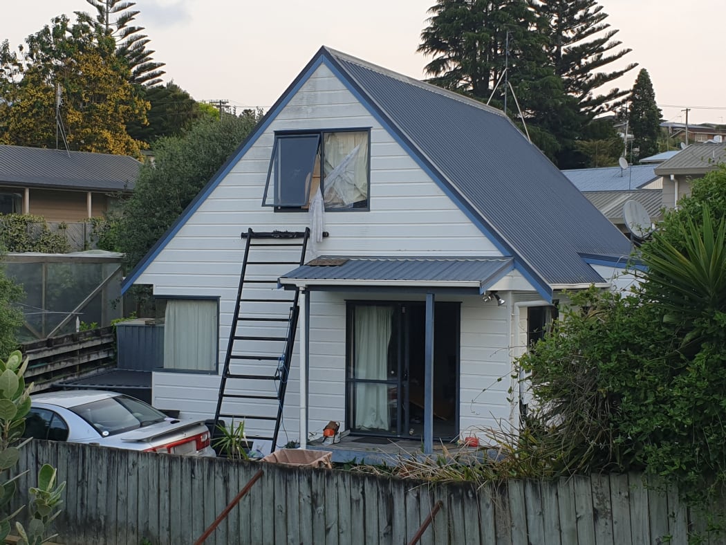 The Tauranga property where police shot a man they say had threatened a woman and child with a machete today.