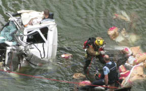 Rescue operation after a truck crashed in the Manawatu Gorge on July 8, 2016.