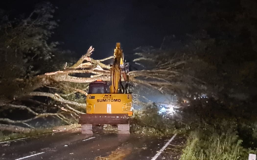 ACE Rentals in Dargaville have been delivering excavators and sweepers through the night to help clear storm damage, but the company's yard flooded with the heavy rain
