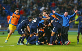 Auckland City players celebrating their third place finish at the 2014 FIFA Club World Cup.