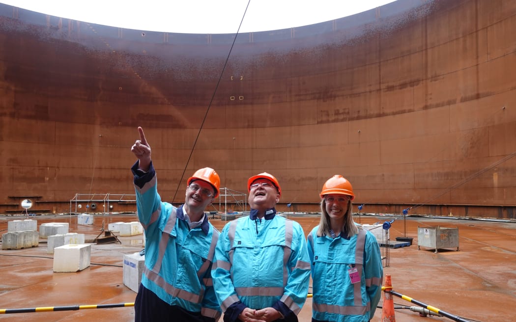 Z Energy chief executive Lindis Jones and corporate affairs general manager Haley Mortimer with Regional Development Minister Shane Jones (centre) in the 18-metre-deep jet fuel tank.