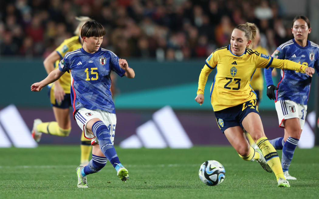 Japan's Aoba Fujino and Sweden's Elin Rubensson battle it out during the FIFA Women’s World Cup Quarter Final
