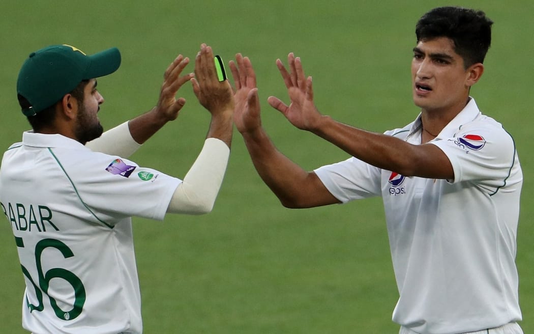 Young Pakistan fast bowler Naseem Shah (right) celebrates taking a wicket in a tour match in Australia.