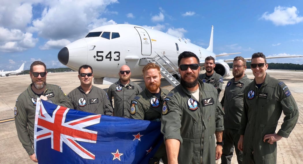 Squadron Leader Ben Smith (fourth from L) with the RNZAF Number 5 Squadron, which has been in Florida since March, training with the US Navy VP-30 Squadron.