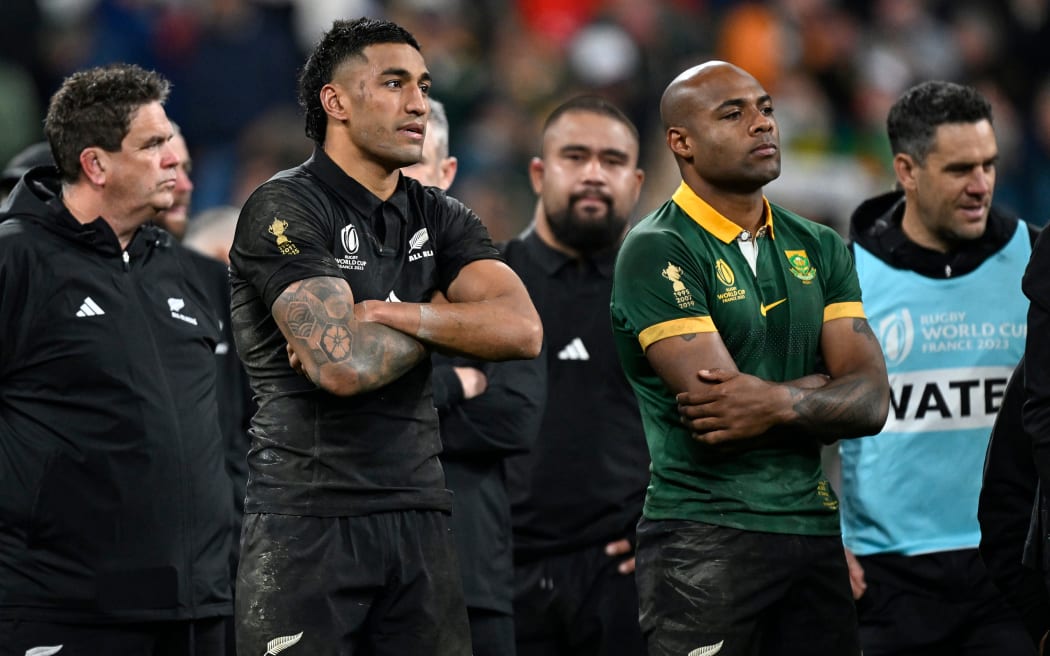 Dejected Rieko Ioane of New Zealand and Mark Telea of New Zealand after losing the final. Rugby World Cup France 2023, New Zealand All Blacks v South Africa FInal match at Stade de France, Saint-Denis, France on Saturday 29 October 2023. Photo credit: Andrew Cornaga / www.photosport.nz