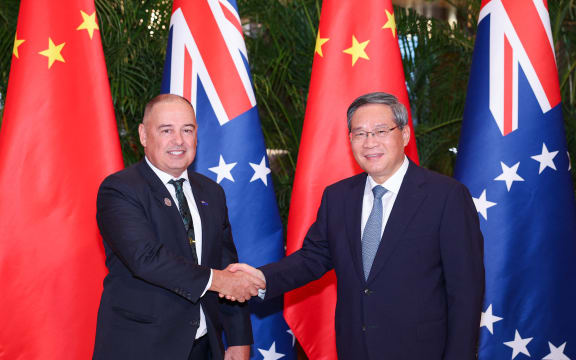 (250214) -- HARBIN, Feb. 14, 2025 (Xinhua) -- Chinese Premier Li Qiang meets with Prime Minister of the Cook Islands Mark Brown in Harbin, northeast China's Heilongjiang Province, Feb. 14, 2025. Brown is here for the closing ceremony of the 9th Asian Winter Games. (Xinhua/Liu Bin) (Photo by LIU BIN / XINHUA / Xinhua via AFP)