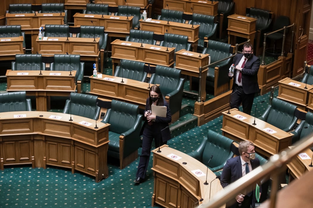 PM Jacinda Ardern and Grant Robertson arrive to the first Question time and sitting of the House in alert level 4 lockdown in the House of Representatives debating chamber.