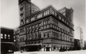 Looking south on Seventh Avenue and 57th Street in Manhattan, the exterior of Carnegie Hall