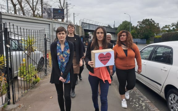 A petition calls for urgent changes to welfare system is delivered to Prime Minister Jacinda Ardern's electorate office in Auckland.