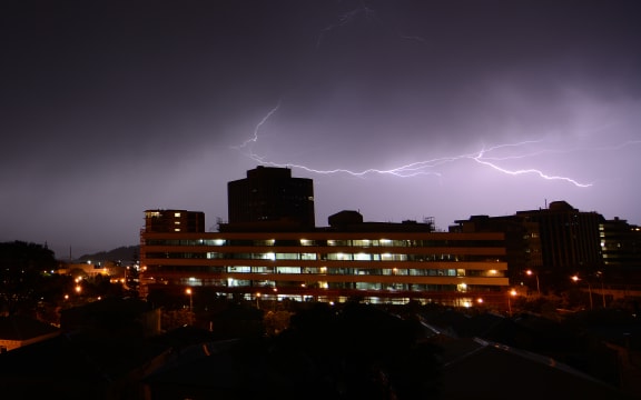 Lightning flash over a multi-storey building in Molesworth St, Wellington.