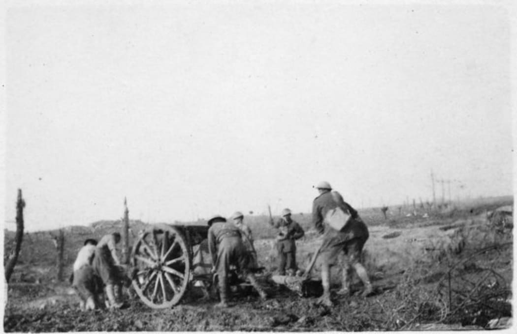 Gun crew in mud at Passchendaele. Stagg, Geoffrey Troughear, 1913-1971 :Views of the Western Front, World War 1914-1918
