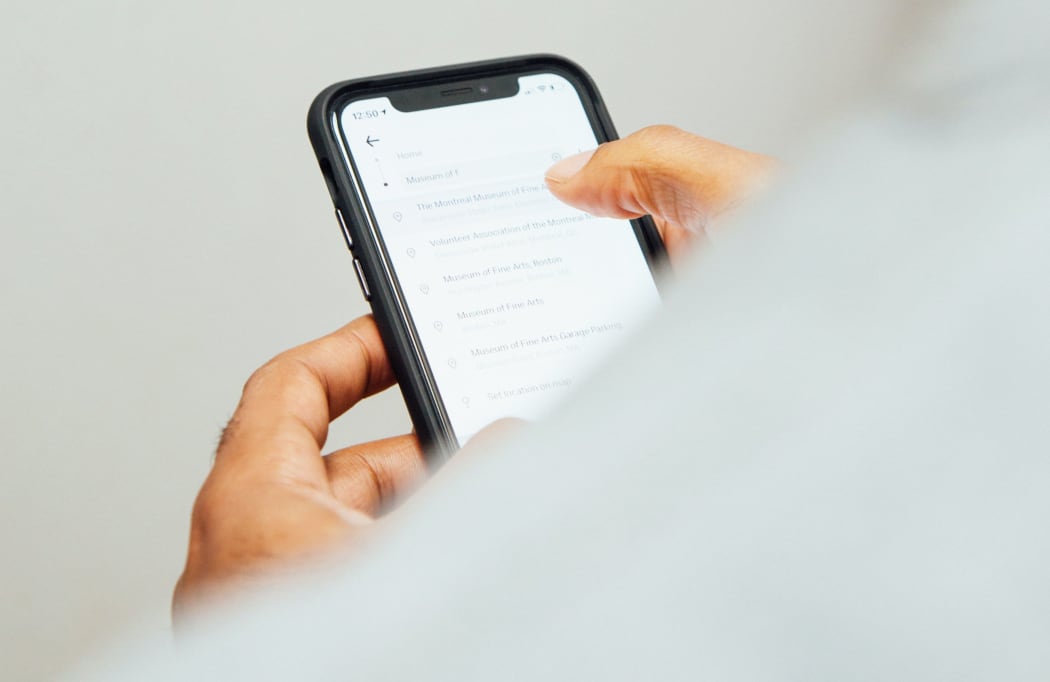 man using iPhone