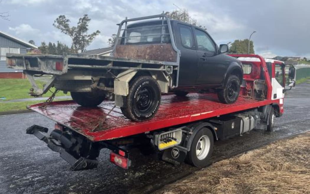 The freshly painted ute police believe was involved in one police car being rammed into in Hamilton.