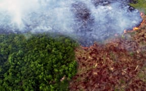 Aerial view of a large forest fire in Ramal do Cinturao Verde, in the Janauaca District, Careiro Castanho, 113 km from Manaus, Amazon region, Brazil, on 4 August 2020