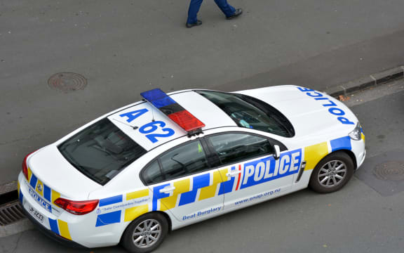 AUCKLAND - MAR 30 2017:New Zealand Police car and officer during a crime respond in Auckland, New Zealand.